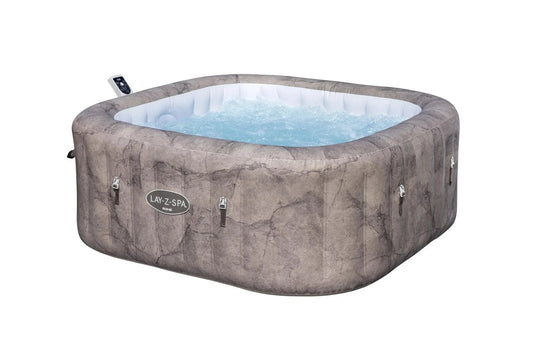 Grijze opblaasbare spa met bubbels