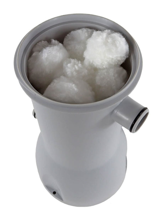 Geopende pomp die is gevuld met filterbollen.